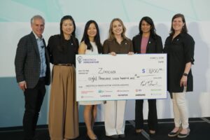 zonova 2026 vision award winner poses with check